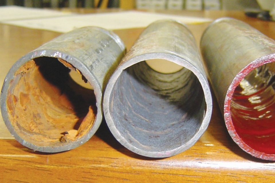 Corroded pipe cleaned pipe epoxy coated pipe slider