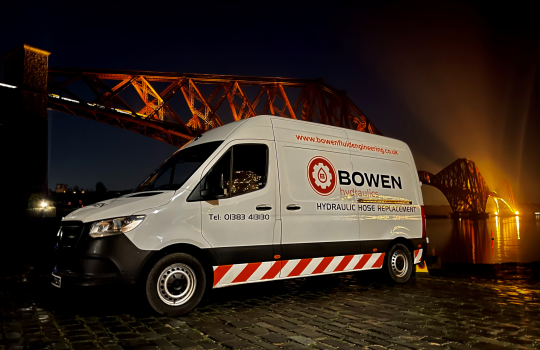 Mobile hose van forth rail bridge at night