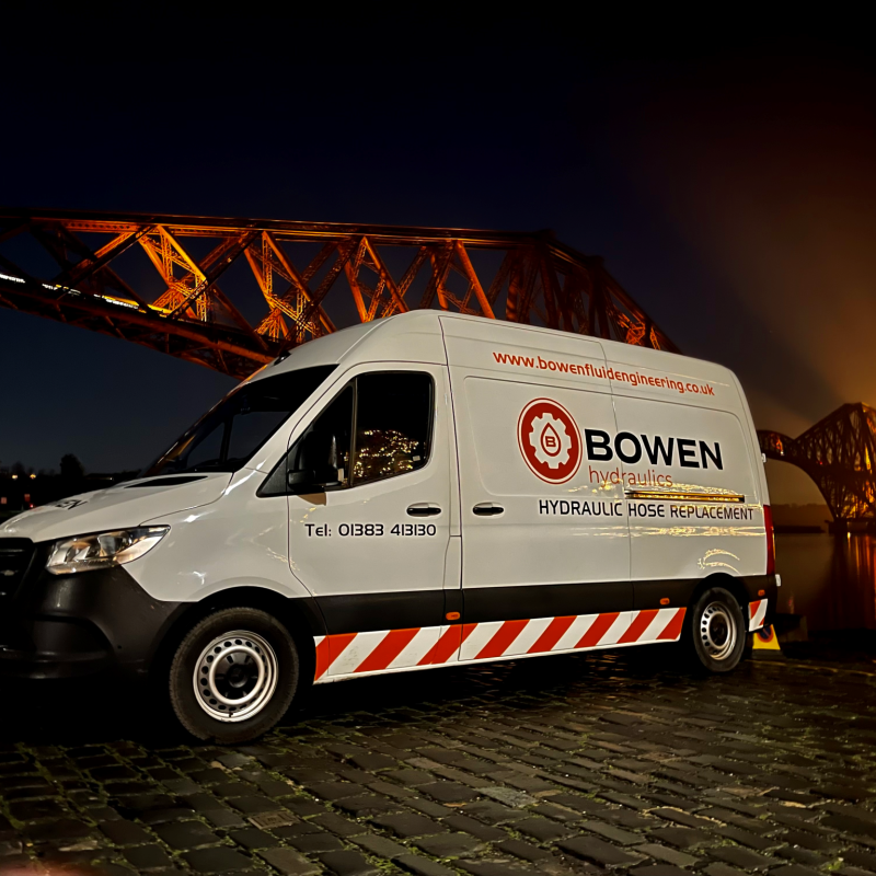 Mobile hose van forth rail bridge at night
